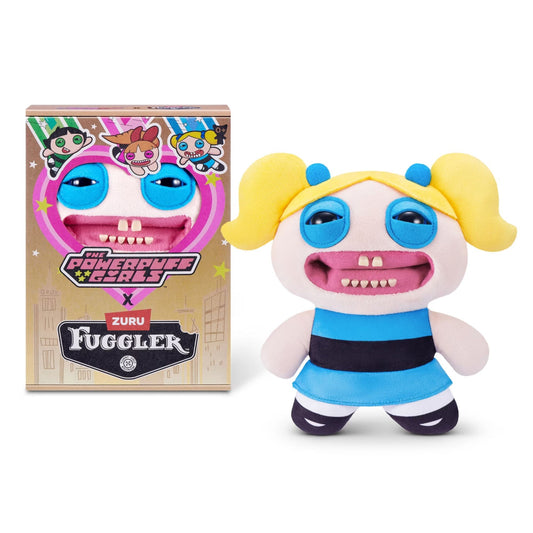 The Fuggler x Powerpuff Girls Bubbles plush toy displayed next to its collector box, featuring blonde pigtails, blue eyes, and a signature toothy grimace.