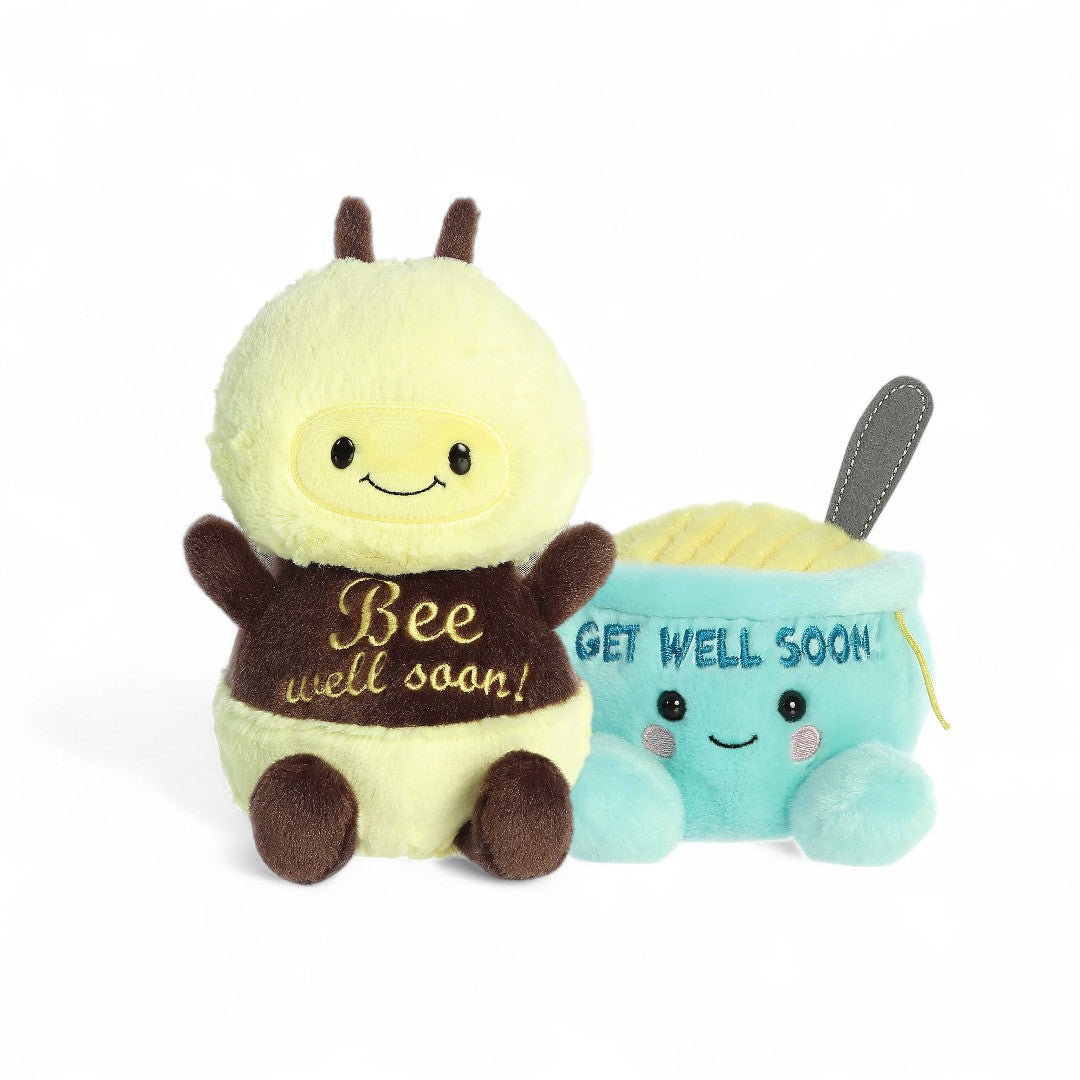 Plush bee toy with a small plush cloud holding a 'Get Well Soon' card on a white background