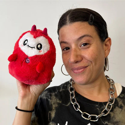 Person holding the Squishable Alter Egos Series 16 Imp Ghost 6-Inch Plush