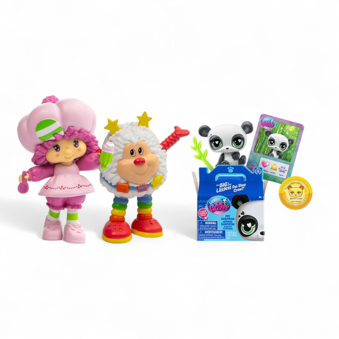 Two colorful toy figures with a panda-themed product and card on a white background