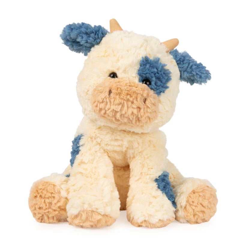 GUND Cozys Cow 10-inch plush, a cream and navy blue spotted cow with textured, rippled fur.