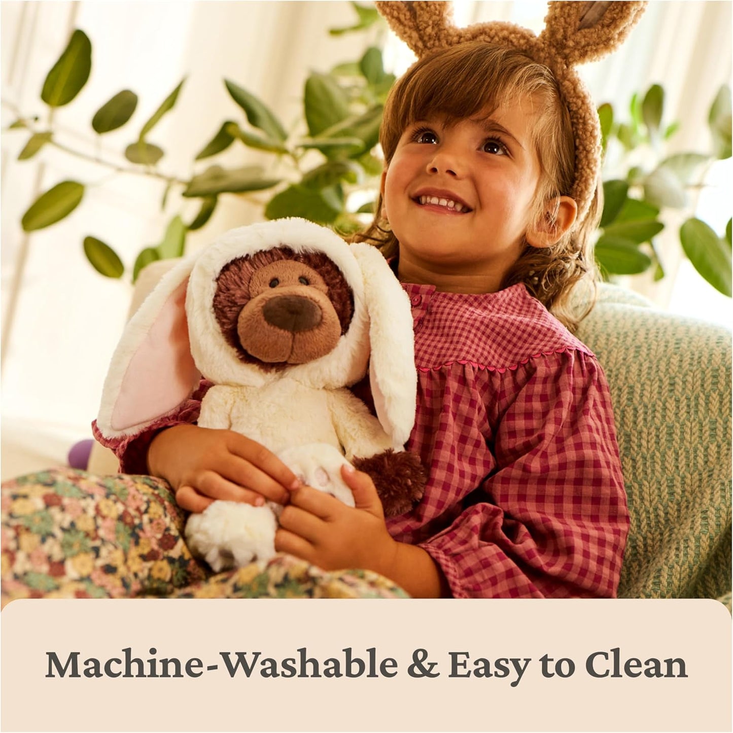 Child wearing bunny ears holding a teddy bear with text 'Machine-Washable & Easy to Clean' at the bottom.