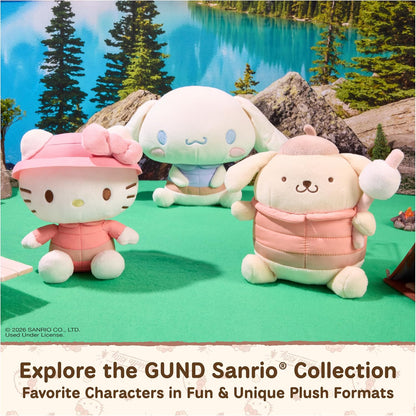 GUND Sanrio Camp Hello Kitty 6-inch plush toy wearing a coral puffer jacket and pink bucket hat