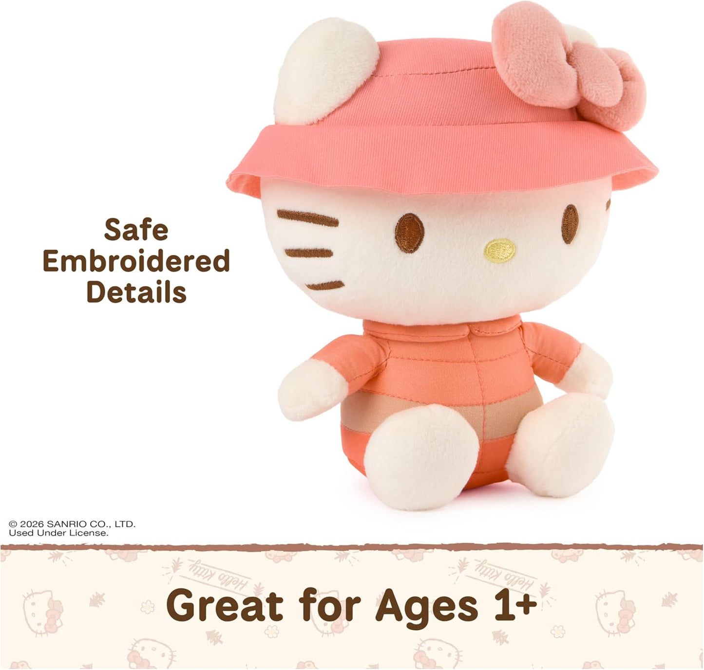 GUND Sanrio Camp Hello Kitty 6-inch plush toy wearing a coral puffer jacket and pink bucket hat