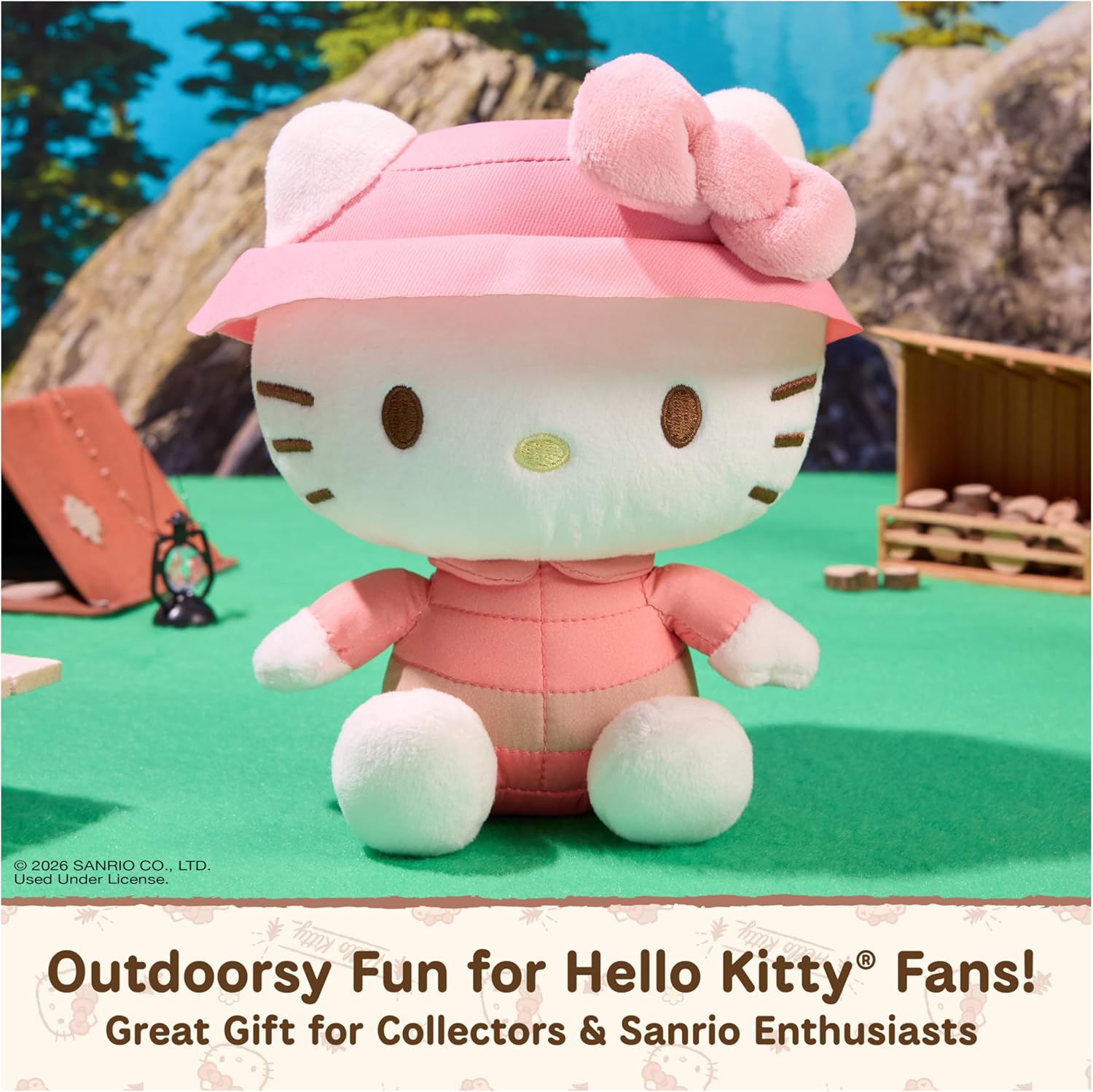 GUND Sanrio Camp Hello Kitty 6-inch plush toy wearing a coral puffer jacket and pink bucket hat