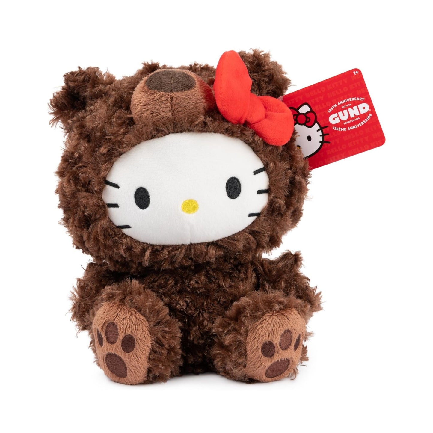 GUND Sanrio Hello Kitty Philbin 10-inch plush featuring Hello Kitty wearing a soft chocolate-brown teddy bear suit with a red bow