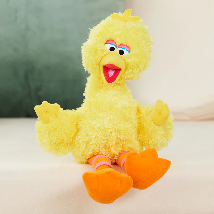 GUND Sesame Street Big Bird 14-inch plush, a shaggy yellow bird with orange and pink striped legs.