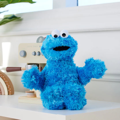 GUND Sesame Street Cookie Monster 12-inch plush with googly eyes on a white surface.