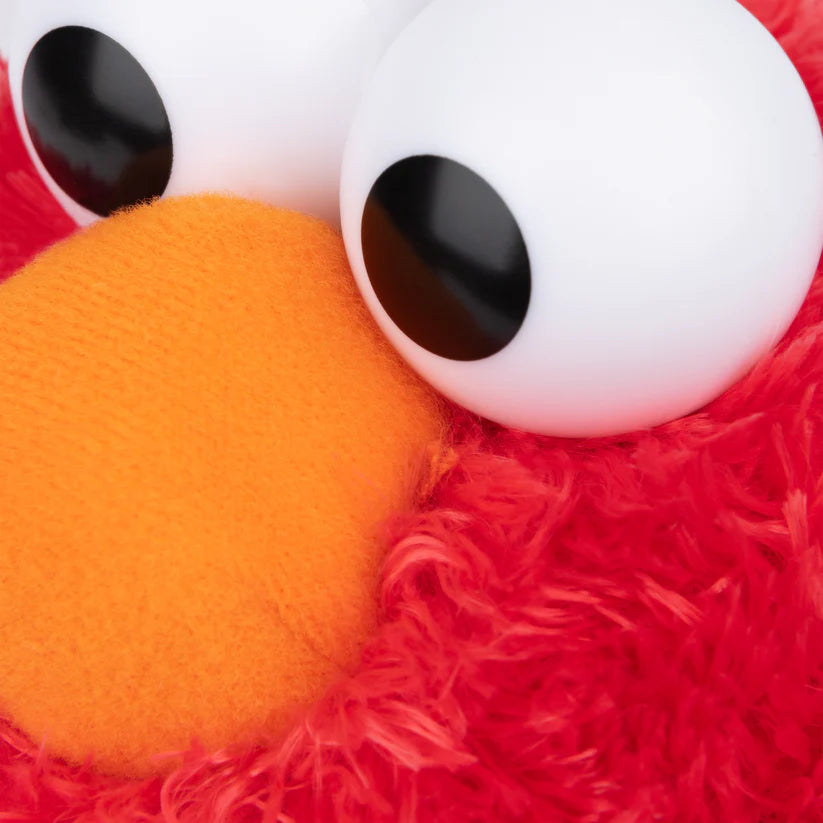 Close up of GUND Sesame Street Elmo 13-inch plush