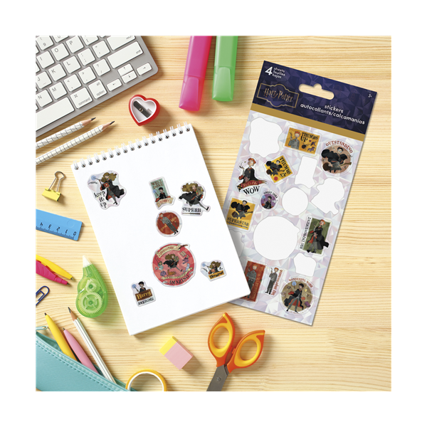 Sticker sheet and packaging on a desk with stationery items