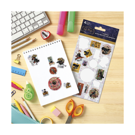 Sticker sheet and packaging on a desk with stationery items