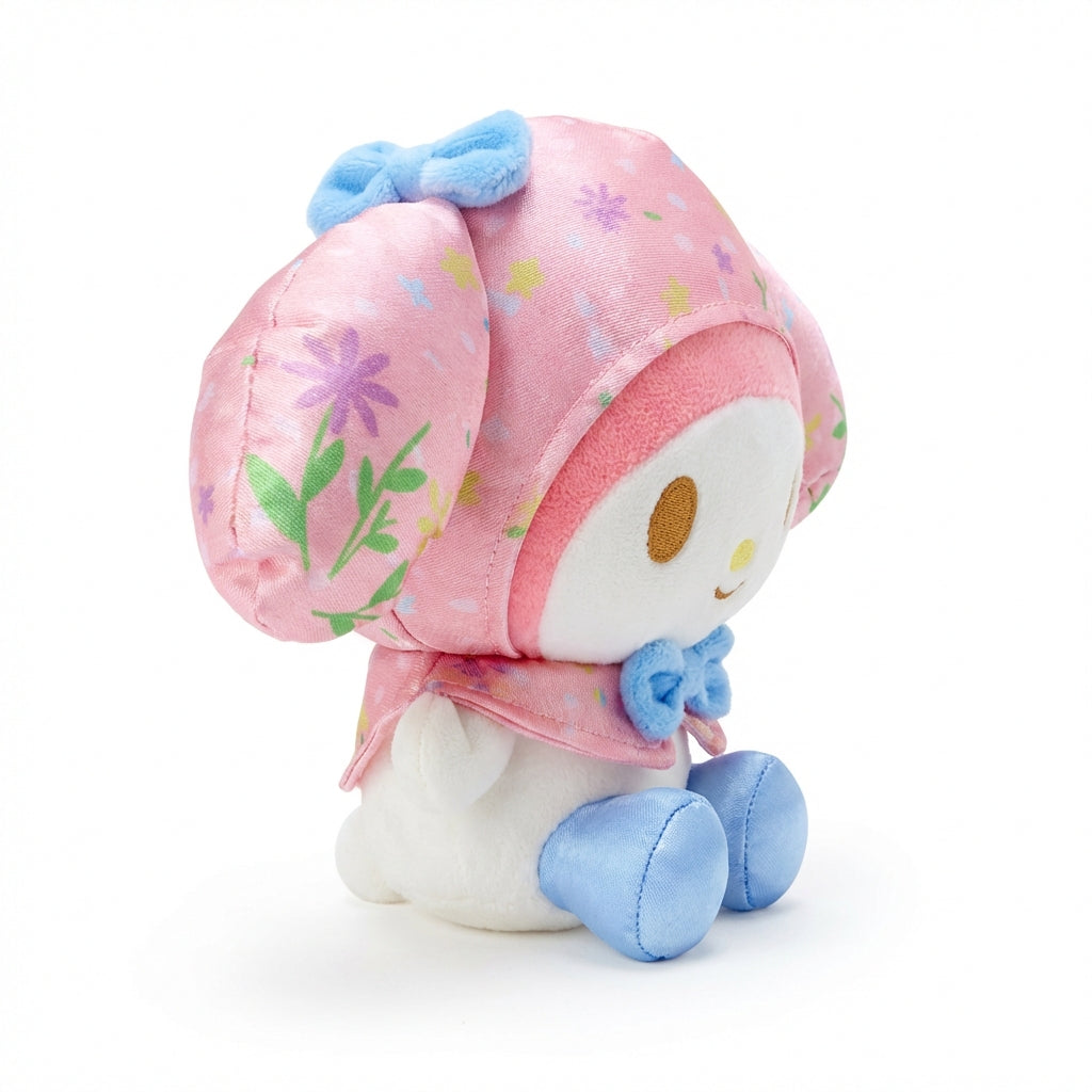 Hello Kitty and Friends plush featuring My Melody wearing a pink floral patterned hood and cape with a blue bow and blue feet.