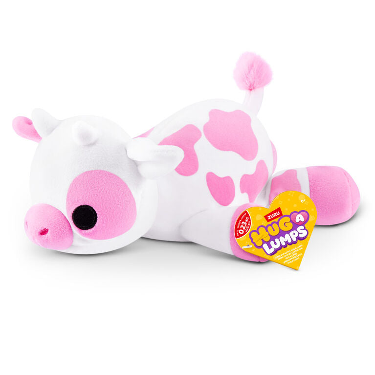 Clover the Cow baby-size weighted plush toy by ZURU featuring a white body with pink spots and a fuzzy pink tail.