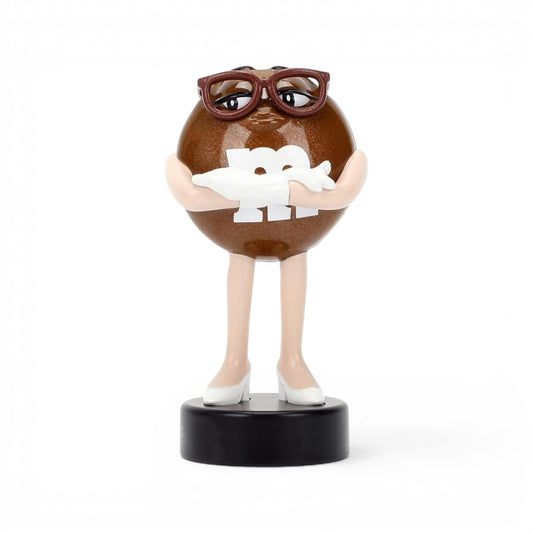Jada Toys M&M's Brown Character 2.5-inch Metalfigs die-cast figure mounted on a black display pedestal.