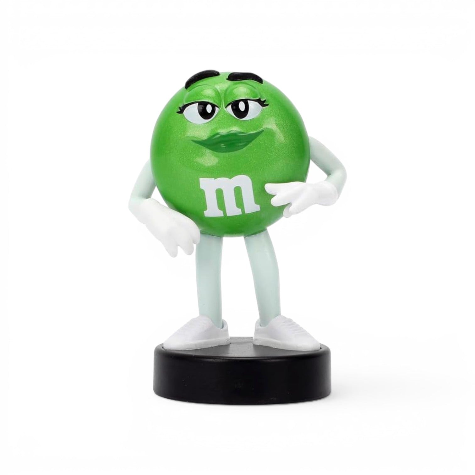 Jada Toys M&M's Green Character 2.5-inch Metalfigs die-cast figure mounted on a black display pedestal.
