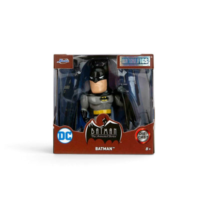 Batman die-cast metal figure in its original window box packaging, featuring the Batman character with a gray and black suit and yellow belt, set against a plain white background.