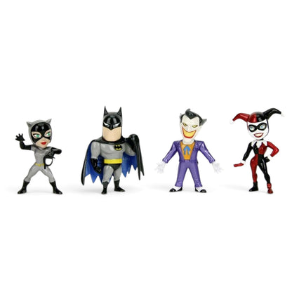 Four DC Comics vinyl action figures of Catwoman, Batman, the Joker, and Harley Quinn standing side by side on a white background.