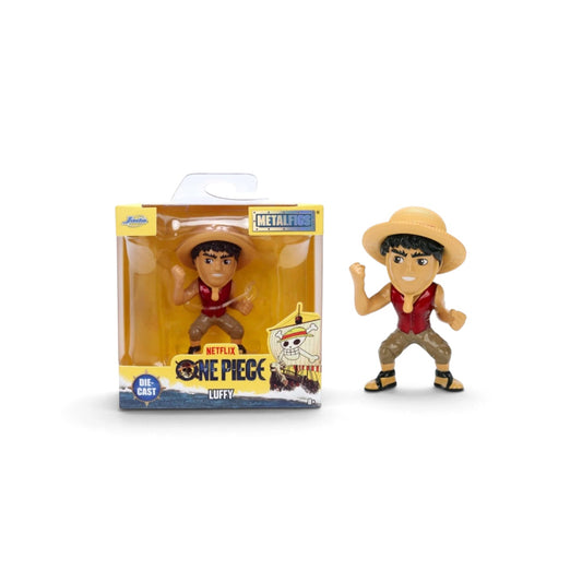 One Piece: Luffy Metalfigs collectible figure shown next to its original window box packaging on a white background.
