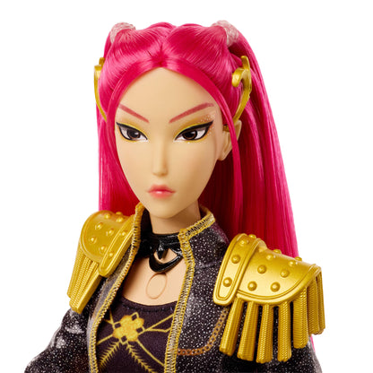 KPop Demon Hunters HUNTR/X Mira singing doll with flowing pink hair, stage-ready makeup, a cropped jacket, and a white mini skirt.