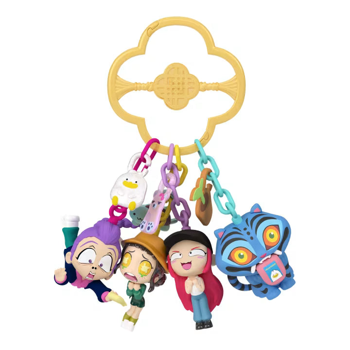Colorful toy charm set with cartoon characters on a white background