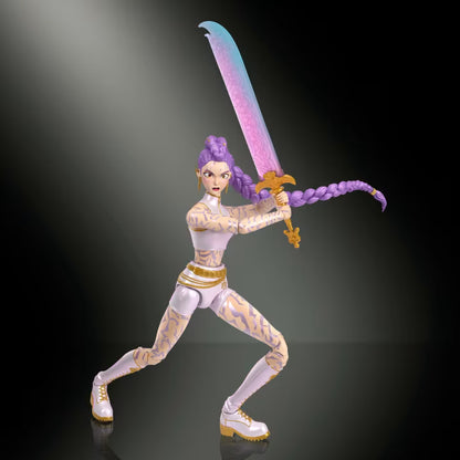 A stylized female action figure posed in a dynamic combat stance, holding a large sword with a blue-to-pink gradient blade and gold hilt. The figure has purple braided hair, pale skin with tan markings, and white-and-gold shoes, set against a dark gradient background with spotlighting.