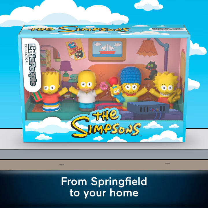 The Simpsons toy figure set in its original window box packaging, featuring Bart, Homer, Maggie, and Lisa Simpson with a cat on a shelf inside a colorful living room scene. The packaging has 'The Simpsons' and 'Matt Groening' branding.