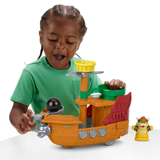 Little People Super Mario Bowser’s Airship playset featuring a toy boat with a cannonball launcher, Bowser figure, and spinning play features.