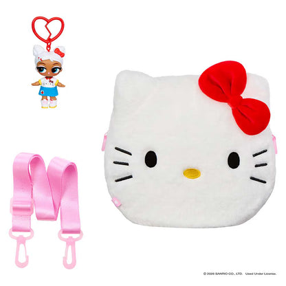 Hello Kitty plush face bag in white with a red bow, shown with a pink shoulder strap and a small doll keychain accessory on a white background.