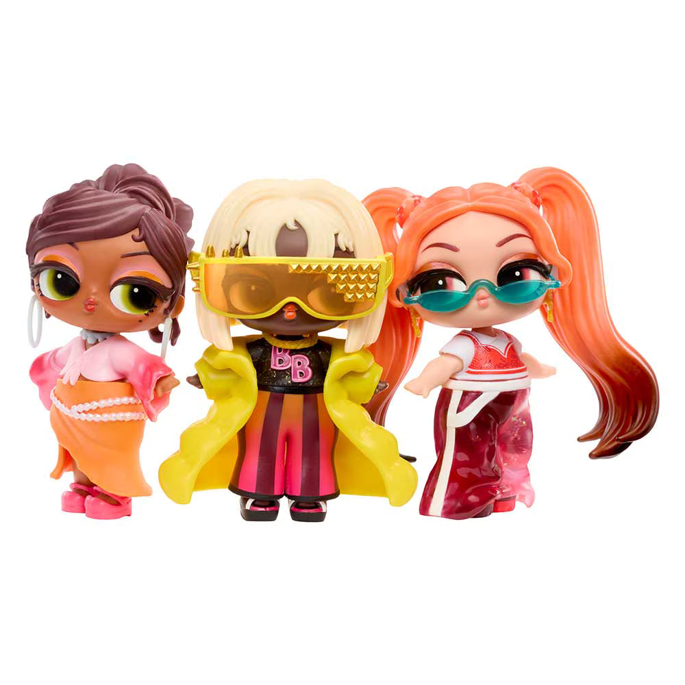 Three stylized doll figures standing side by side against a plain white background. The left doll has brown hair in a bun and wears a pink and orange outfit.