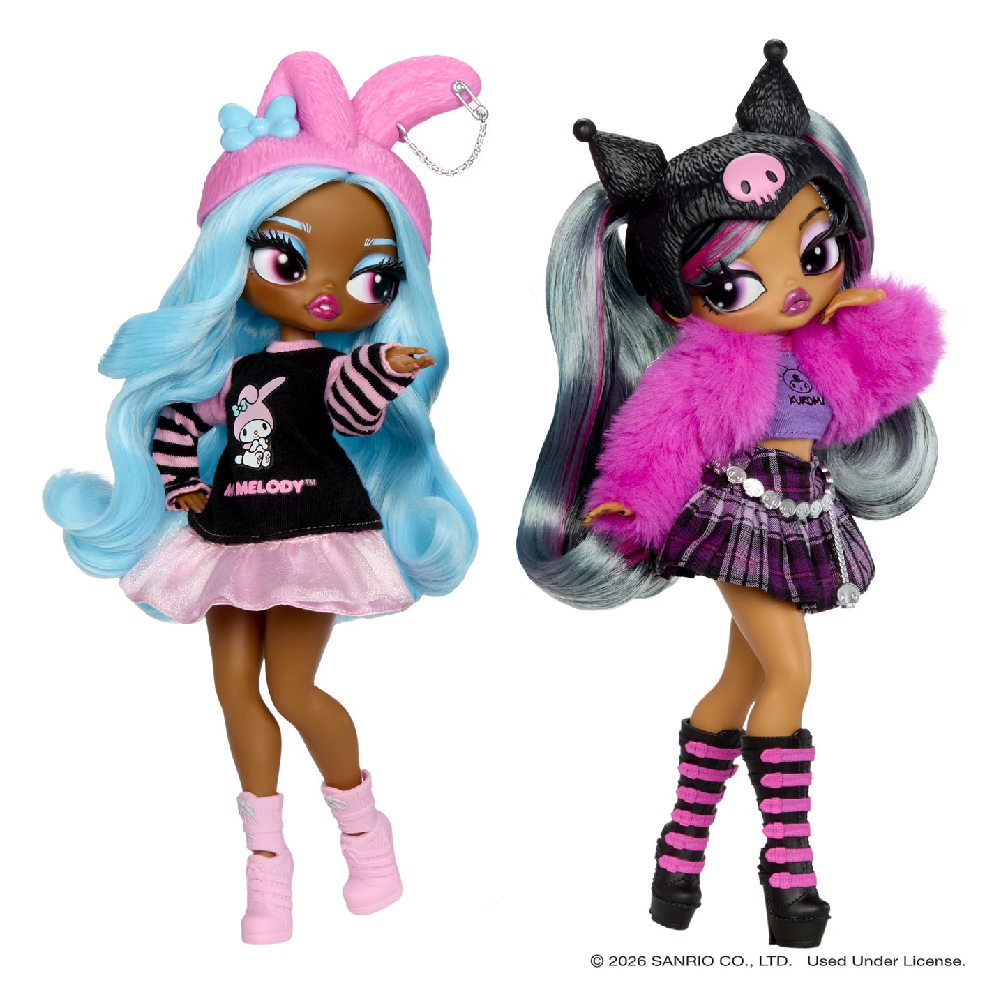 Two fashion dolls standing side by side on a white background. The doll on the left has long wavy light blue hair, a pink bunny hat, and a black-and-pink outfit with a pink skirt.