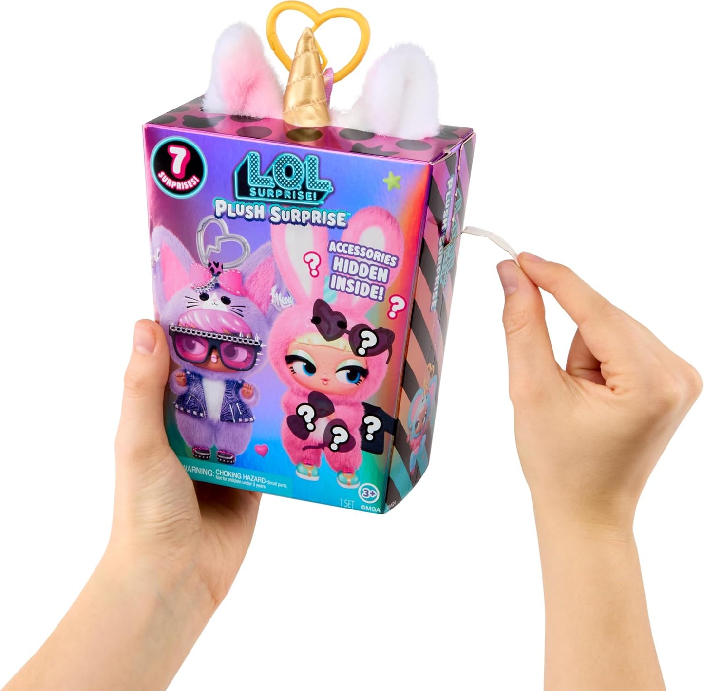 A person holds a LOL Surprise Plush Surprise toy box against a white background, with both hands visible and a white string extending from the side of the package.