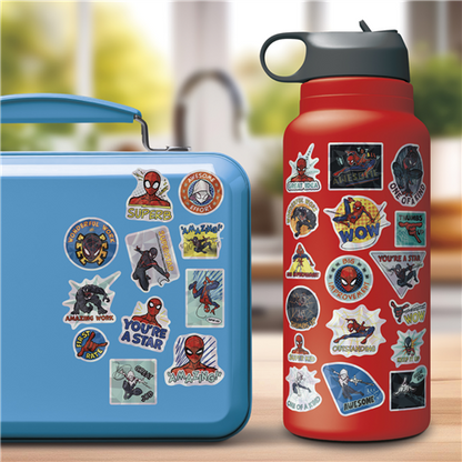 Blue lunch box and red water bottle with superhero stickers on a blurred background