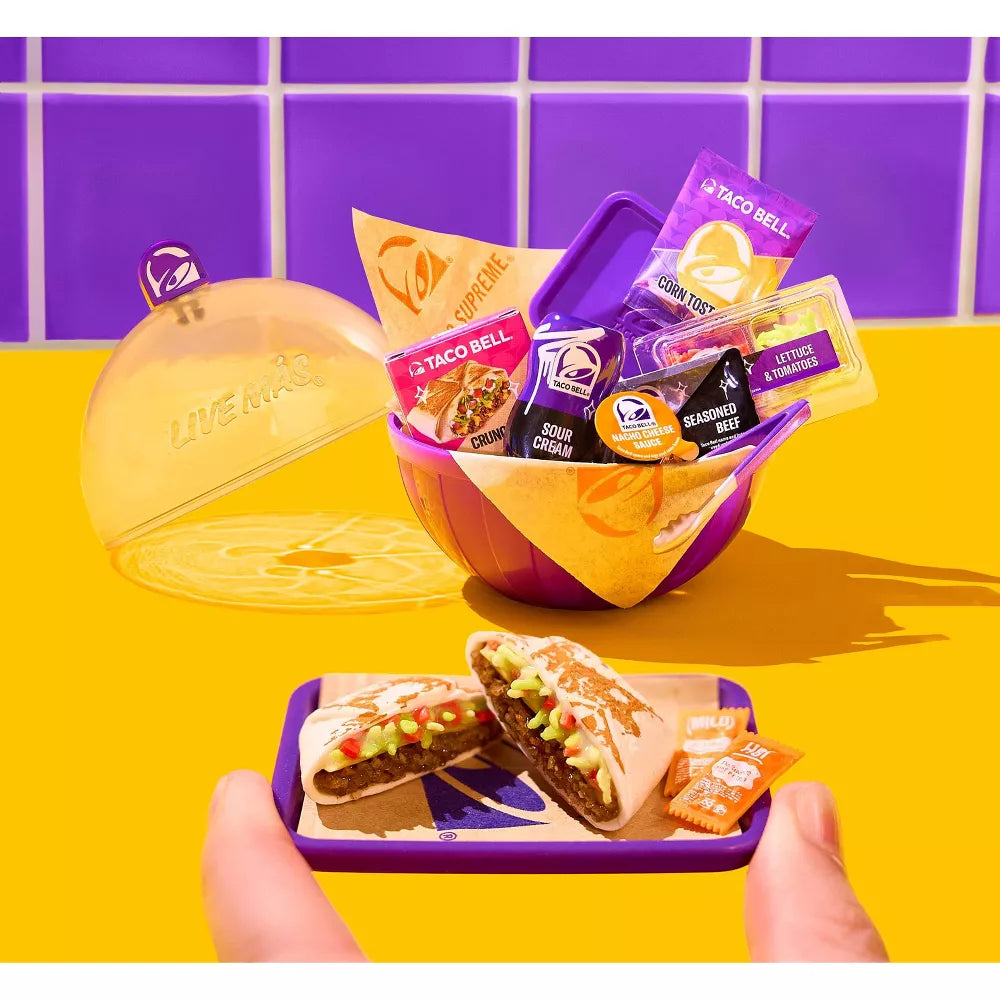 Taco Bell food items and packaging on a yellow and purple background