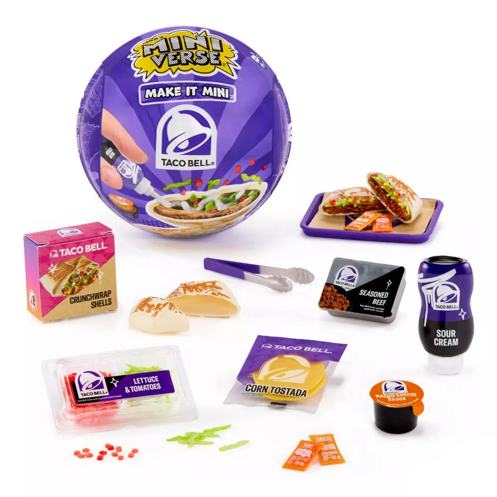 MGA's Miniverse Make It Mini Taco Bell surprise ball and various miniature food ingredients including a Crunchwrap Supreme and sour cream.