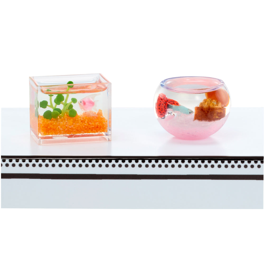 MGA's Miniverse Make It Mini Animals Series 2 surprise capsule and crafted miniature mouse with a rocket ship tube habitat.