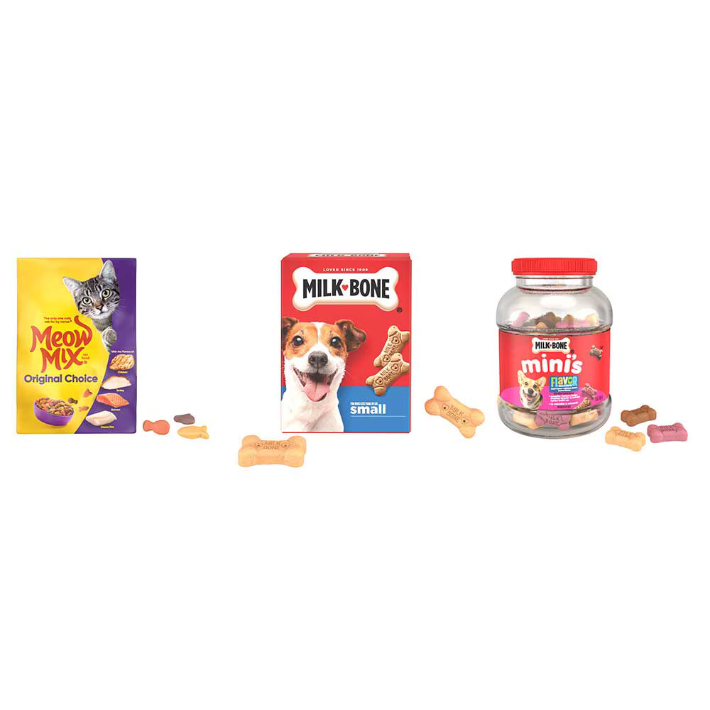 A pet treat bundle featuring a box of Meow Mix cat treats, a box of Milk-Bone dog treats, a jar of Pick One dog treats, and several loose bone-shaped treats on a plain white background.