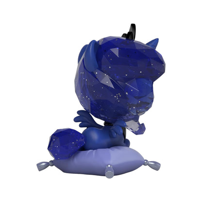 Blue crystal-like figurine on a white background