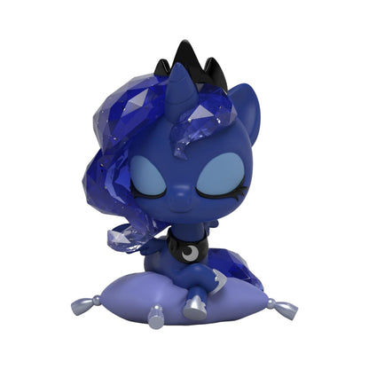 Blue animated character with a crown on a white background