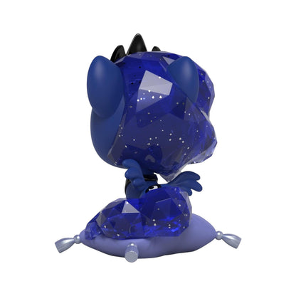 Blue crystal-like figurine on a white background