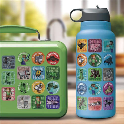 Green lunch box and blue water bottle with colorful graphics on a blurred background