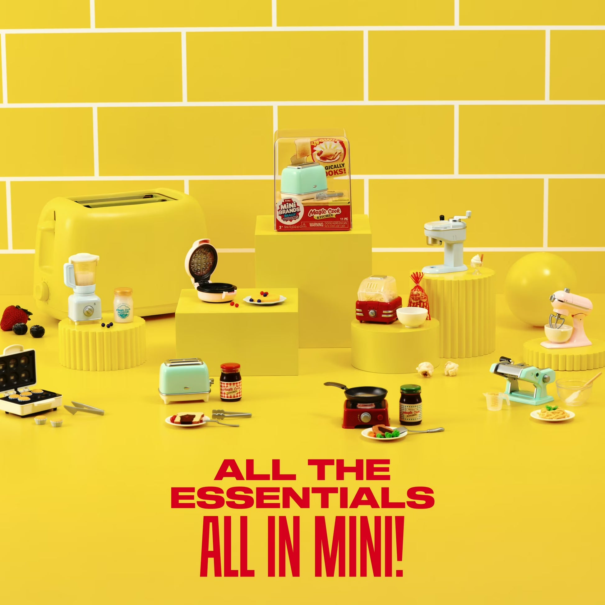 Miniature kitchen appliances and items on a yellow background with text 'All the Essentials All in Mini!'.