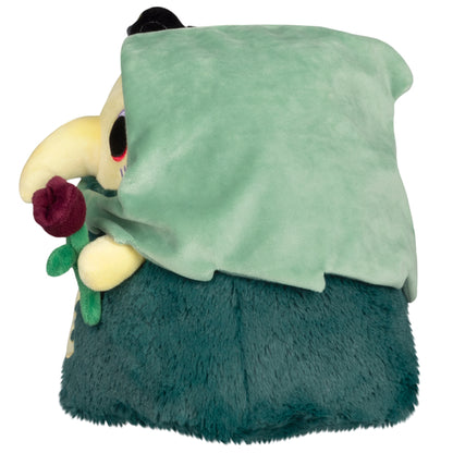 Mini Squishable Graveyard Plague Nurse plush with green cloak, skeleton embroidery, rose, and bat Side View