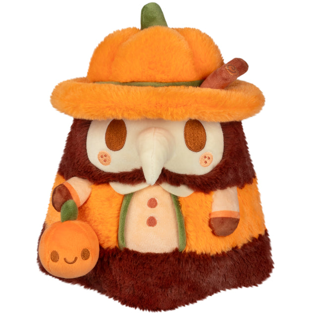 Mini Squishable Pumpkin Spice Doctor Plague plush with pumpkin hat and cinnamon stick