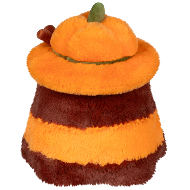 Back of Mini Squishable Pumpkin Spice Doctor Plague plush with pumpkin hat and cinnamon stick