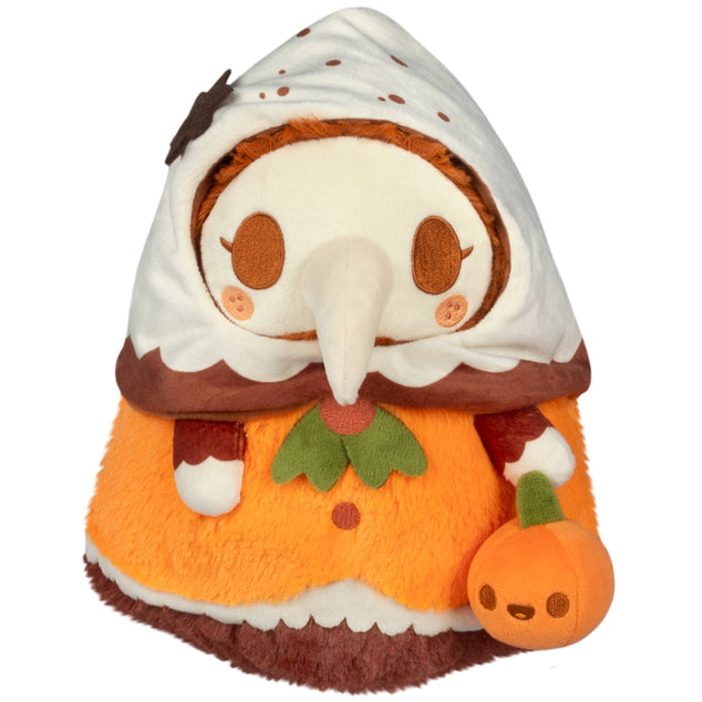 Mini Squishable Pumpkin Spice Plague Nurse plush with pumpkin accessory
