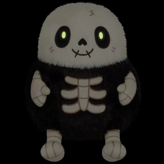 Glow in the dark Mini Squishable Skeleton plush with stitched grin and embroidered bones