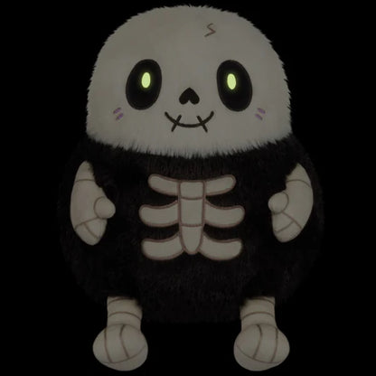 Glow in the dark Mini Squishable Skeleton plush with stitched grin and embroidered bones