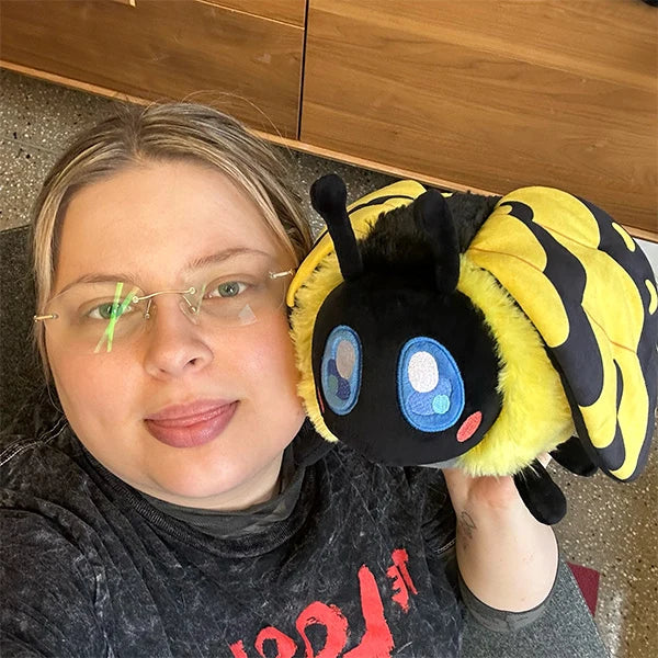 Mini Squishable Tiger Butterfly plush with yellow and black striped wings, big blue eyes, red cheeks, and little black antennae.