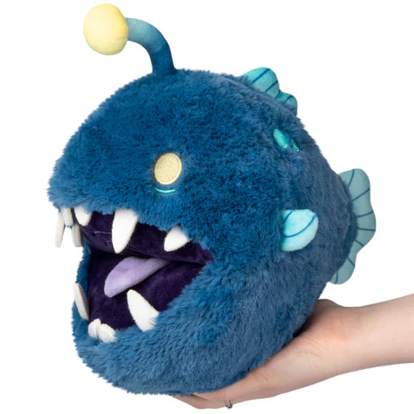 Squishable Mini Anglerfish 10-Inch Plush, a dark blue deep-sea anglerfish soft toy