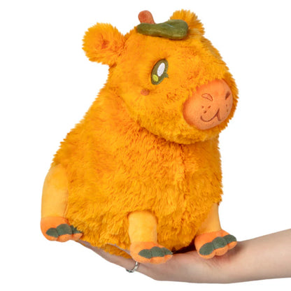 Squishable Mini Citrus Capybara 9-Inch Plush, a round orange capybara soft toy